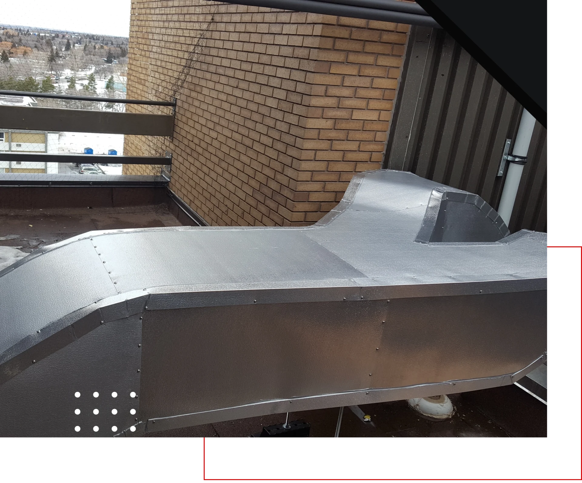 Metal ductwork on building rooftop.